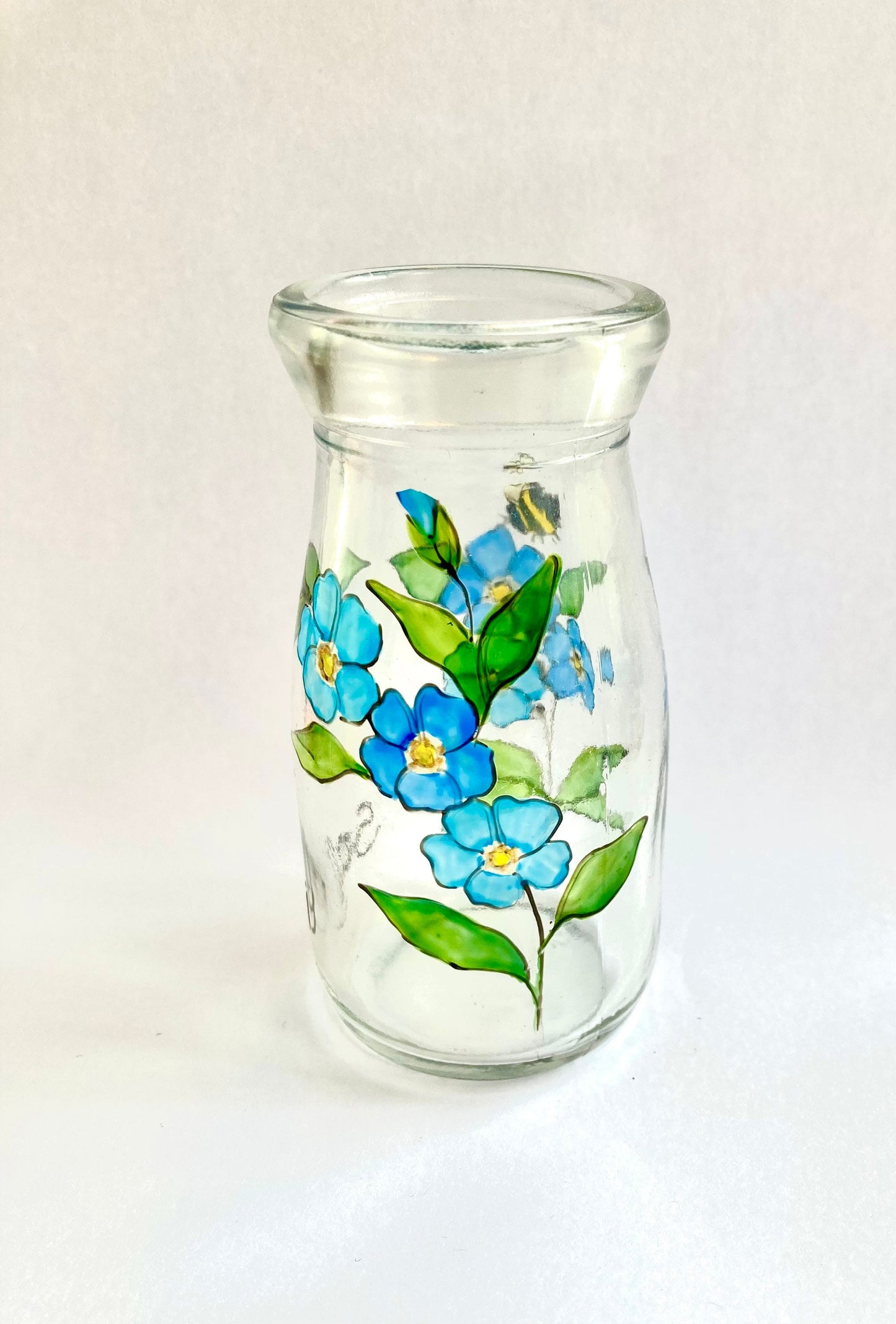 Forget-me-nots and bee mini bottle vase